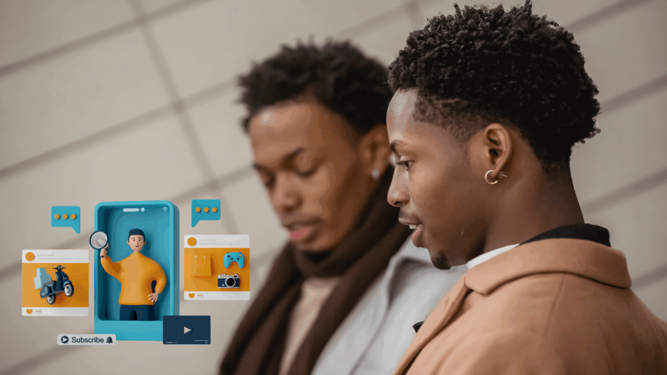 Two men examine a phone screen, likely discussing an online marketplace for Black-owned businesses and cultural commerce.